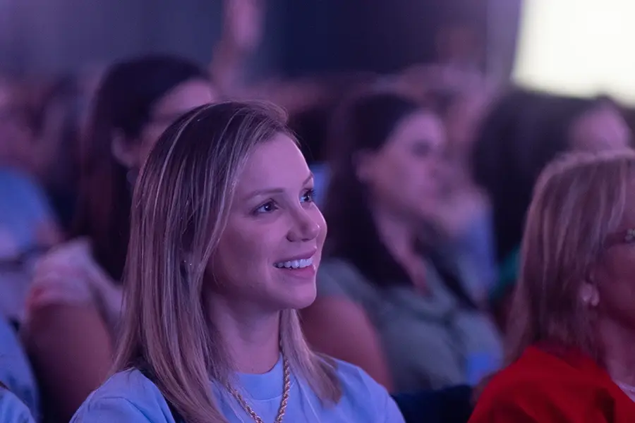 Women listening God's Word at conference in Brazil